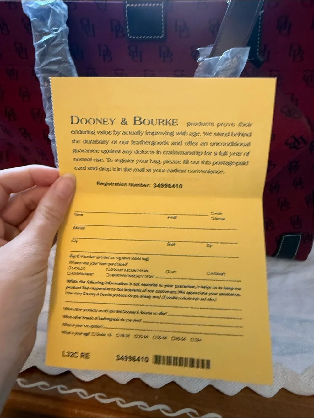 Dooney & Bourke Red Logo Canvas Tote with Brown Leather Trim